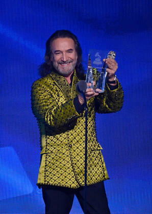 Honoree Marco Antonio Solís accepts the Person of the Year award onstage during the 23rd annual Latin Grammy Awards at the Michelob Ultra Arena at Mandalay Bay Resort and Casino in Las Vegas, Nevada on Thursday, November 17, 2022.  LAV20221117725 JIMxRUYMEN
