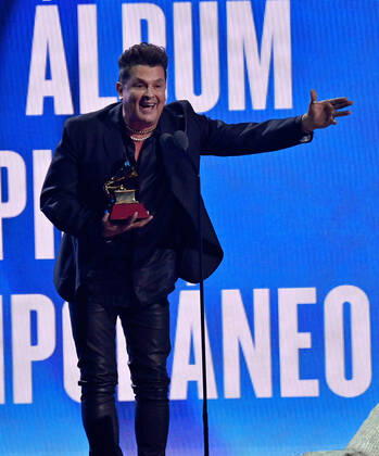 Carlos Vives accepts the Best Contemporary Tropical Album award for Cumbiana II onstage during the 23rd annual Latin Grammy Awards at the Michelob Ultra Arena at Mandalay Bay Resort and Casino in Las Vegas, Nevada on Thursday, November 17, 2022.  LAV20221117750 JIMxRUYMEN