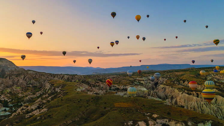 Turkey balloons Cappadocia Goreme Kapadokya , Sunrise in the mountains of Capadocia Sunrise with hot air balloons in Cappadocia, Turkey balloons in Cappadocia Goreme Kapadokya, and Sunrise in the mountains of Cappadocia. Copyright: xZoonar.com FokkexBaarssenx 19156484