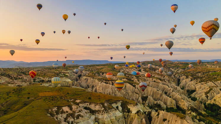 Turkey balloons Cappadocia Goreme Kapadokya , Sunrise in the mountains of Capadocia Sunrise with hot air balloons in Cappadocia, Turkey balloons in Cappadocia Goreme Kapadokya, and Sunrise in the mountains of Cappadocia with many hot air ballon in the sky Copyright: xZoonar.com FokkexBaarssenx 19156497