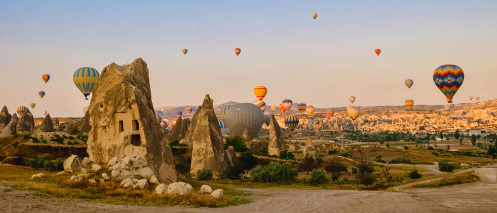 Turkey balloons Cappadocia Goreme Kapadokya , Sunrise in the mountains of Capadocia Sunrise with hot air balloons in Cappadocia, Turkey balloons in Cappadocia Goreme Kapadokya, and Sunrise in the mountains of Cappadocia with many hot air ballon in the sky Copyright: xZoonar.com FokkexBaarssenx 19156543
