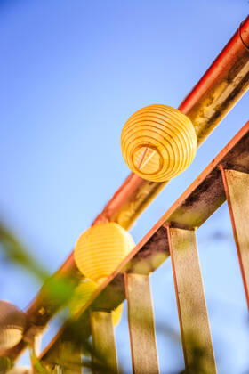 Summer feeling on the balcony: Close up of lampions Close up of summer lampions on a balcony, leisure time in the summer holidays Copyright: xZoonar.com PatrickxDaxenbichlerx 14031680