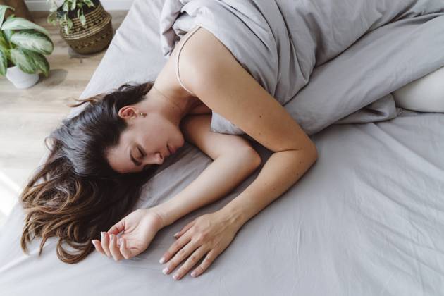 Woman sleeping in bed at home model released, Symbolfoto property released, OSF01098