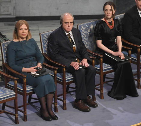 Belarusian Natallia Pinchuki (wife of 2022 Nobel Peace Prize winner - jailed Belarusian activist Ales Bialiatski), Russian Yan Rachinsky (chairman of the international Memorial Board), and Ukrainian Oleksandra Matviichuk (head of the Ukrainian Center for Civil Liberties) attend the 2022 Nobel Peace Prize award ceremony at the City Hall in Oslo, Norway on December 10, 2022.  LON20221210224 PAULxTREADWAY