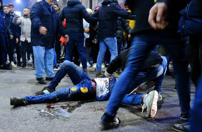 Milan - Stabbing occurred near Corso Buenos Aires during the celebrations of Morocco fans for their victory in the World Cup (in the photo, a man on the ground bleeding after the stabbing) Editorial Usage Only  Copyright: xmaurizioxmaulex xIPAx Agenzia_Fotogramma_FGR3700806