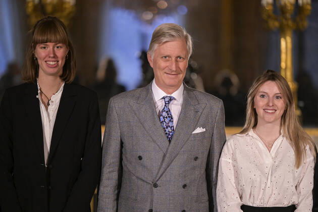 Winner Fien Engelen, King Philippe - Filip of Belgium and Winner Lea Defour pose for the photographer during the award ceremony of the 2022 edition of the Belgodyssee prize for young journalists, at the Royal Palace in Brussels, Tuesday 13 December 2022. The contest is an initiative of the Prince Philippe Fund, the VRT and the RTBF, in collaboration with Metro and L Avenir, and with the support of the Chancellery of the Prime Minister and Brussels Airlines.  LAURIExDIEFFEMBACQ 55994705
