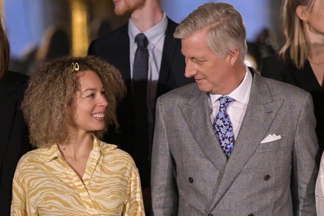 Belgian singer Lubiana and King Philippe - Filip of Belgium pictured during the award ceremony of the 2022 edition of the Belgodyssee prize for young journalists, at the Royal Palace in Brussels, Tuesday 13 December 2022. The contest is an initiative of the Prince Philippe Fund, the VRT and the RTBF, in collaboration with Metro and L Avenir, and with the support of the Chancellery of the Prime Minister and Brussels Airlines.  LAURIExDIEFFEMBACQ 55995227