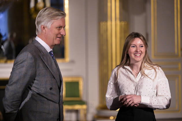 King Philippe - Filip of Belgium and Winner Lea Defour pictured during the award ceremony of the 2022 edition of the Belgodyssee prize for young journalists, at the Royal Palace in Brussels, Tuesday 13 December 2022. The contest is an initiative of the Prince Philippe Fund, the VRT and the RTBF, in collaboration with Metro and L Avenir, and with the support of the Chancellery of the Prime Minister and Brussels Airlines.  LAURIExDIEFFEMBACQ 55997345