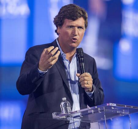 December 17, 2022 - Phoenix, Arizona, USA - Fox News host TUCKER CARLSON speaks at Turning Point USA s AmericaFest 2022. Phoenix USA - ZUMAce6_ 20221217_zaf_ce6_002 Copyright: xBrianxCahnx