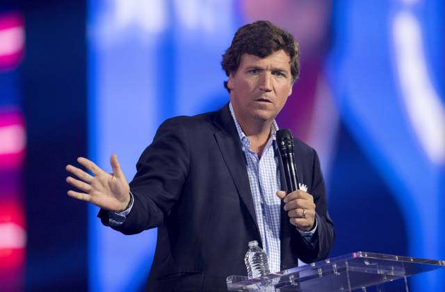 December 17, 2022 - Phoenix, Arizona, USA - Fox News host TUCKER CARLSON speaks at Turning Point USA s AmericaFest 2022. Phoenix USA - ZUMAce6_ 20221217_zaf_ce6_011 Copyright: xBrianxCahnx