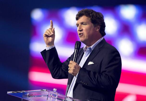 News Bilder des Tages December 17, 2022 - Phoenix, Arizona, USA - Fox News host TUCKER CARLSON speaks at Turning Point USA s AmericaFest 2022. Phoenix USA - ZUMAce6_ 20221217_zaf_ce6_015 Copyright: xBrianxCahnx