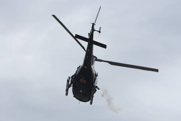 BRASÍLIA, DF - 08.01.2023: TERRORISMO ANTIDEMOCRÁTICO EM BRASÍLIA - Photo, Federal Police helicopter firing. This Sunday (8) terrorist Bolsonarists generate chaos in Brasilia in an attempted coup with the invasion of the STF, National Congress and the Planalto Palace. x2317285x  TonxMolina