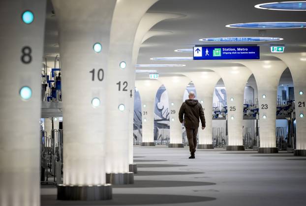 AMSTERDAM - The new bicycle parking at Amsterdam Central. The new Stationsplein parking facility has room for 7,000 bicycles. The bicycle shed was built under water and is connected underground to the metro and station hall. ANP KOEN VAN WEEL netherlands out - belgium out