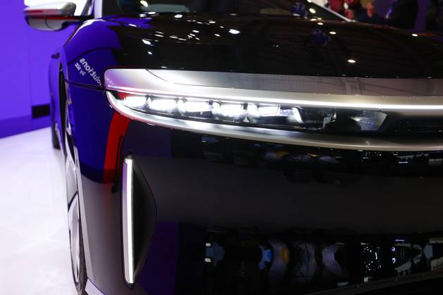 Lucid Motors And Tesla Motors Shows His Newest Technologies In The Mobile World Congress 23 BARCELONA, SPAIN - MARCH 11: A detail of the Lucid Air, the longest range, fastest charging luxury electric car by Lucid Motors, an American electric vehicle company, exhibited during the Mobile World Congress 2023 on March 11, 2023, in Barcelona, Spain. Barcelona Catalonia Spain Copyright: xJoanxCrosx originalFilename: cros-notitle230211_npztJ