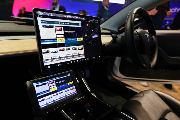 Lucid Motors And Tesla Motors Shows His Newest Technologies In The Mobile World Congress 23 BARCELONA, SPAIN - MARCH 11: The inside of a Tesla Model S, the newest model of the S series of the American multinational automotive and clean energy company, equipped to work as a police car with vehicle registration plate fast reading and detection, exhibited during the Mobile World Congress 2023 on March 11, 2023, in Barcelona, Spain. Barcelona Catalonia Spain Copyright: xJoanxCrosx originalFilename: cros-notitle230210_np5jw