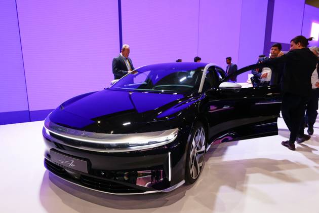 Lucid Motors And Tesla Motors Shows His Newest Technologies In The Mobile World Congress 23 BARCELONA, SPAIN - MARCH 11: The Lucid Air, the longest range, fastest charging luxury electric car by Lucid Motors, an American electric vehicle company, exhibited during the Mobile World Congress 2023 on March 11, 2023, in Barcelona, Spain. Barcelona Catalonia Spain Copyright: xJoanxCrosx originalFilename: cros-notitle230310_npW76