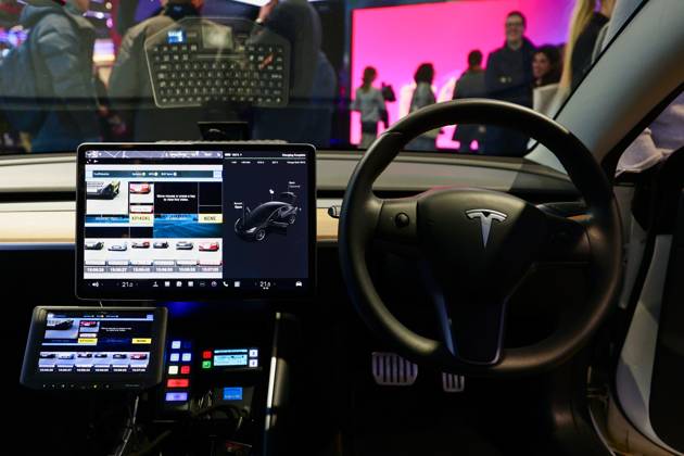 Lucid Motors And Tesla Motors Shows His Newest Technologies In The Mobile World Congress 23 BARCELONA, SPAIN - MARCH 11: The inside of a Tesla Model S, the newest model of the S series of the American multinational automotive and clean energy company, equipped to work as a police car with vehicle registration plate fast reading and detection, exhibited during the Mobile World Congress 2023 on March 11, 2023, in Barcelona, Spain. Barcelona Catalonia Spain Copyright: xJoanxCrosx originalFilename: cros-notitle230310_npYDX