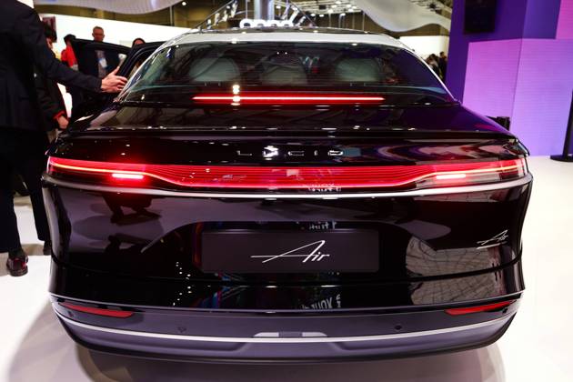 Lucid Motors And Tesla Motors Shows His Newest Technologies In The Mobile World Congress 23 BARCELONA, SPAIN - MARCH 11: The Lucid Air, the longest range, fastest charging luxury electric car by Lucid Motors, an American electric vehicle company, exhibited during the Mobile World Congress 2023 on March 11, 2023, in Barcelona, Spain. Barcelona Catalonia Spain Copyright: xJoanxCrosx originalFilename: cros-notitle230310_npYUB