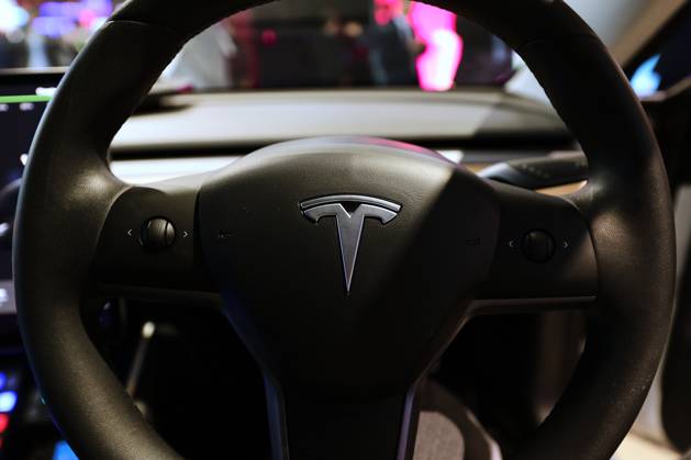 Lucid Motors And Tesla Motors Shows His Newest Technologies In The Mobile World Congress 23 BARCELONA, SPAIN - MARCH 11: The steering wheel of a Tesla Model S, the newest model of the S series of the American multinational automotive and clean energy company, exhibited during the Mobile World Congress 2023 on March 11, 2023, in Barcelona, Spain. Barcelona Catalonia Spain Copyright: xJoanxCrosx originalFilename: cros-notitle230310_npSqp