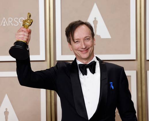 Volker Bertelmann, winner of the award for Best Original Score for All Quiet On The Western Front,??? appears backstage with his Oscar during the 95th annual Academy Awards at Loews Hollywood Hotel in the Hollywood section of Los Angeles on Sunday, March 12, 2023.  LAP20230312218 JOHNxANGELILLO