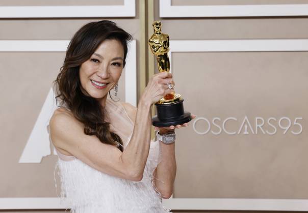 Michelle Yeoh, winner of the award for Best Actress in a Leading Role for Everything Everywhere All at Once, appears backstage with her Oscar during the 95th annual Academy Awards at Loews Hollywood Hotel in the Hollywood section of Los Angeles on Sunday, March 12, 2023.  LAP202303125004 JohnxAngelillo