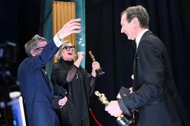 Ernestine Hipper and Christian M. Goldbeck backstage with the Oscar® for Production Design greet Volker Bertelmann, winner of the Oscar® for Original Score during the live ABC telecast of the 95th Oscars® at the Dolby® Theatre at Ovation Hollywood on Sunday, March 12, 2023. Copyright: xA.M.P.A.S.x 34494-538PLX