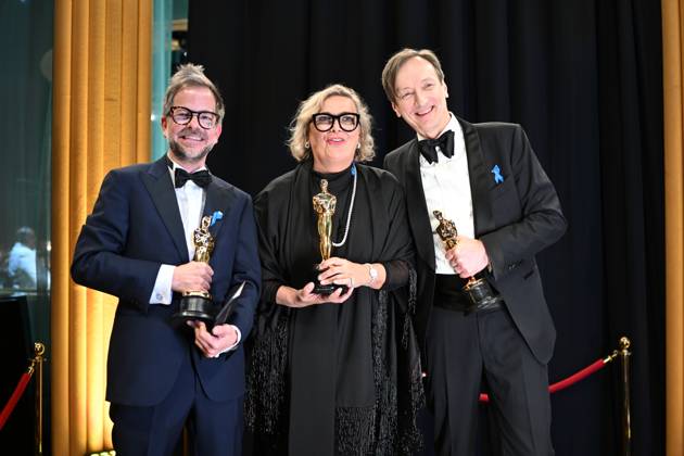 Ernestine Hipper and Christian M. Goldbeck pose backstage with the Oscar® for Production Design and Volker Bertelmann poses with the Oscar® for Original Score during the live ABC telecast of the 95th Oscars® at the Dolby® Theatre at Ovation Hollywood on Sunday, March 12, 2023. Copyright: xA.M.P.A.S.x 34494-539PLX