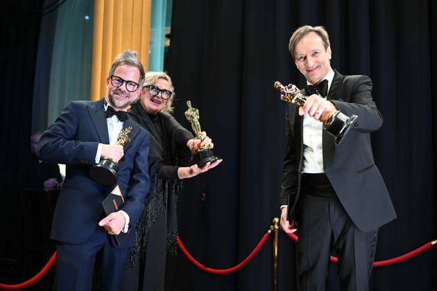 Ernestine Hipper and Christian M. Goldbeck pose backstage with the Oscar® for Production Design and Volker Bertelmann poses with the Oscar® for Original Score during the live ABC telecast of the 95th Oscars® at the Dolby® Theatre at Ovation Hollywood on Sunday, March 12, 2023. Copyright: xA.M.P.A.S.x 34494-540PLX