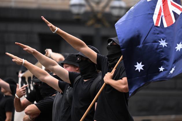 Bilder des Jahres 2023, News 03 März News Themen der Woche KW11 ANTI TRANSPHOBIA RALLY MELBOURNE, Neo-Nazi protesters face-off with transgender rights supporters outside Parliament House in Melbourne, Saturday, March 18, 2023. ( NO ARCHIVING, EDITORIAL USE ONLY, NO USE IN BOOKS WITHOUT CONSENT MELBOURNE VIC AUSTRALIA  Copyright: xJAMESxROSSx 20230318001776303348