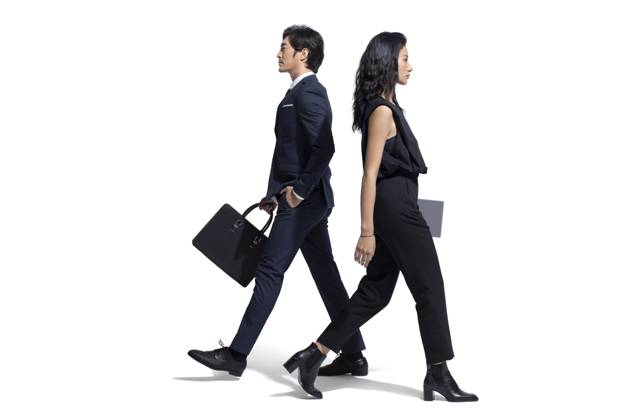Confident Chinese business people walking Beijing China Copyright: xLanexOateyx bji06460289