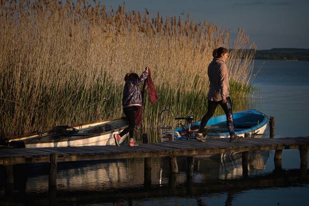 Fishing boats on Hungary s Lake Balaton at sunset on April 30, 2023. (CTKxPhoto PetrxMalina) CTKPhotoF202305040004001 CTKPhotoF202305040004001