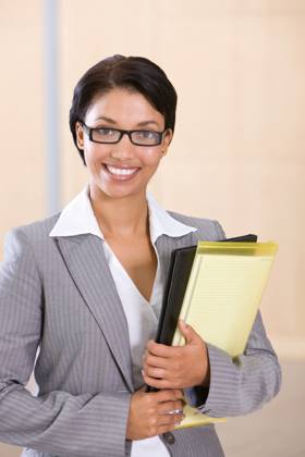 Portrait of a smiling businesswoman holding folder Copyright: xKxTiedgex xDesignxPicsx , 30891971 Copyright: KxTiedgex xDesignxPics 30891971