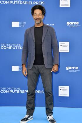 Tyron Ricketts bei der Verleihung des Deutschen Computerspielpreises 2023 im Spindler & Klatt. Berlin, 11.05.2023