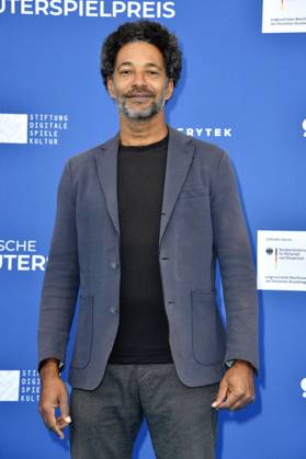 Tyron Ricketts bei der Verleihung des Deutschen Computerspielpreises 2023 im Spindler & Klatt. Berlin, 11.05.2023