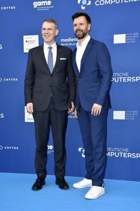 Florian Graf und Felix Falk bei der Verleihung des Deutschen Computerspielpreises 2023 im Spindler & Klatt. Berlin, 11.05.2023