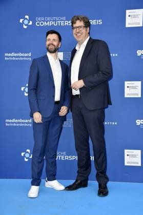 Felix Falk und Michael Kellner bei der Verleihung des Deutschen Computerspielpreises 2023 im Spindler & Klatt. Berlin, 11.05.2023