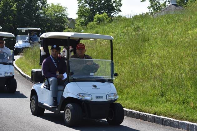 May 26, 2023, Sterling, Virginia, United States: Former President of the United States Donald J. Trump drives a golf cart at his golf course. Former President of the United States Donald J. Trump plays golf prior to the LIV Golf Round 1 Shotgun Start at Trump National Golf Club Washington DC in Sterling. Prior to round one of the LIV Golf Washington DC 2023 event, Former President of the United States Donald J. Trump played golf on his golf course in Sterling, Virginia Friday morning into the afternoon. Sterling United States - ZUMAs197 20230526_zaa_s197_092 Copyright: xKylexMazzax