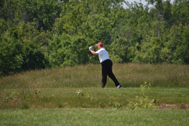 May 26, 2023, Sterling, Virginia, United States: Former President of the United States Donald J. Trump swings his put as he plays golf at his golf course. Former President of the United States Donald J. Trump plays golf prior to the LIV Golf Round 1 Shotgun Start at Trump National Golf Club Washington DC in Sterling. Prior to round one of the LIV Golf Washington DC 2023 event, Former President of the United States Donald J. Trump played golf on his golf course in Sterling, Virginia Friday morning into the afternoon. Sterling United States - ZUMAs197 20230526_zaa_s197_100 Copyright: xKylexMazzax