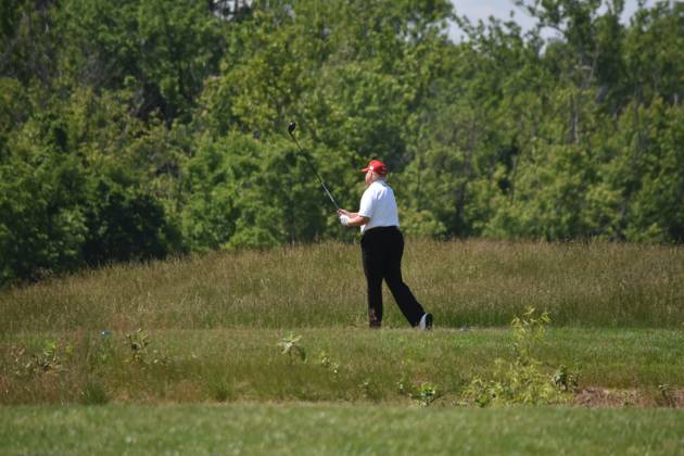 May 26, 2023, Sterling, Virginia, United States: Former President of the United States Donald J. Trump swings his put as he plays golf at his golf course. Former President of the United States Donald J. Trump plays golf prior to the LIV Golf Round 1 Shotgun Start at Trump National Golf Club Washington DC in Sterling. Prior to round one of the LIV Golf Washington DC 2023 event, Former President of the United States Donald J. Trump played golf on his golf course in Sterling, Virginia Friday morning into the afternoon. Sterling United States - ZUMAs197 20230526_zaa_s197_099 Copyright: xKylexMazzax