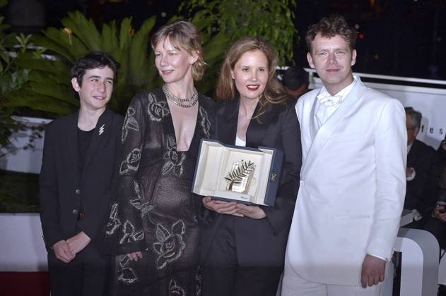 Milo Machado Graner, Sandra Hüller, Director Justine Triet, and Antoine Reinartz pose with The Palme D Or Award for Anatomy of a Fall during the Palme D Or winners photocalat the 76th annual Cannes film festival at Palais des Festivals on Saturday, May 27, 2023 in Cannes, France.  CAN20230527233 RoccoxSpaziani