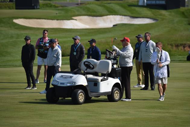 May 25, 2023, Sterling, Virginia, United States: Former President of the United States Donald J. Trump grabs a golf stick out of the golf cart during the Pro-Am round of LIV Golf. Former President of the United States Donald J. Trump played golf in the LIV Golf Washington DC Pro-Am Round at Trump National Golf Club Washington DC in Sterling, Virginia, United States on May 25, 2023. Sterling United States - ZUMAs197 20230525_zaa_s197_095 Copyright: xKylexMazzax
