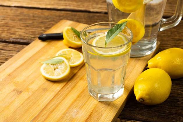 Close-up of lemonade in jug and drinking glass with lemons and leaves on cutting board over table Close-up of lemonade in jug and drinking glass with lemons and leaves on cutting board over table. Unaltered, wood, drink, yellow, citrus fruit, food, healthy concept., model released, , property released, Cape Town, South Africa, 09.05.2022, 3679653.jpg, close,lemonade,jug,drinking glass,lemon,leaf,cutting board,table,unaltered,wood,yellow,citrus fruit,food,healthy,concept,fresh,organic,wooden,closeup,natural,green,fruit,plant,diet,delicious,background,drink,white,health,sweet,tasty,ingredient,nutrition,meal,freshness,drinking,glass,cutting,board,citrus