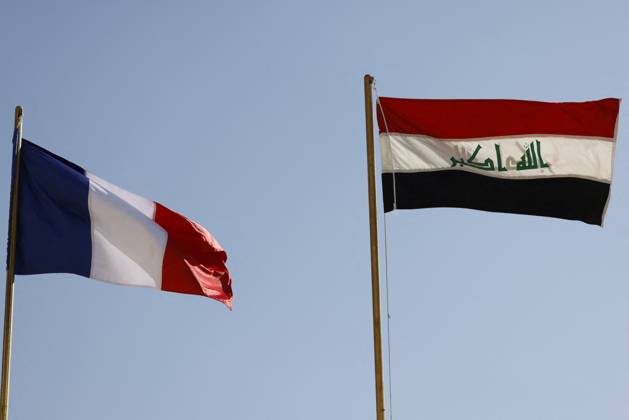 French President Emmanuel Macron in Baghdad - Iraq The national flags of Iraq (R) and France flutter at the presidential palace during an official welcoming ceremony for French President Emmanuel Macron in Baghdad on August 28, 2021. - Macron is among leaders set to attend a regional summit today in Iraq, with the Taliban s takeover of Afghanistan and a deadly jihadist attack in Kabul overshadowing the meeting. Photo by Ludovic Marin pool ABACAPRESS;COM Baghdad Iraq Copyright: xMarinxLudovic Pool ABACAx 778085_004 MarinxLudovic Pool ABACAx 778085_004