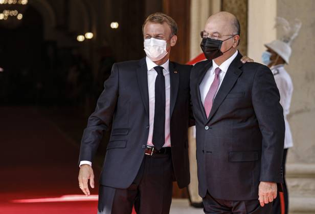French President Emmanuel Macron in Baghdad - Iraq Iraqi President Barham Saleh (R) welcomes his French countepart Emmanuel Macron in Baghdad on August 28, 2021. - Macron is among leaders set to attend a regional summit today in Iraq, with the Taliban s takeover of Afghanistan and a deadly jihadist attack in Kabul overshadowing the meeting. Photo by Ludovic Marin pool ABACAPRESS;COM Baghdad Iraq Copyright: xMarinxLudovic Pool ABACAx 778085_008 MarinxLudovic Pool ABACAx 778085_008