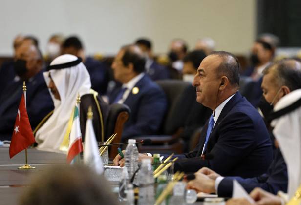 French President Emmanuel Macron in Baghdad - Iraq Turkey s Foreign Minister Mevlut Cavusoglu (R) attends the Baghdad conference in the Iraqi capital on August 28, 2021. (Photo by Ludovic MARIN POOL ABACAPRESS.COM Baghdad Iraq Copyright: xMarinxLudovic Pool ABACAx 778120_026 MarinxLudovic Pool ABACAx 778120_026