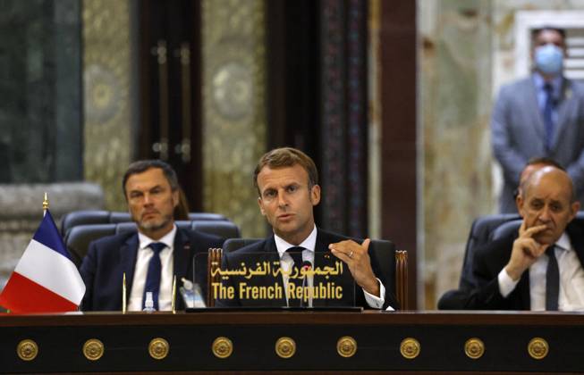 French President Emmanuel Macron in Baghdad - Iraq French President Emmanuel Macron speaks, accompanied by French Foreign Affairs Minister Jean-Yves Le Drian (R), during the Baghdad conference in the Iraqi capital on August 28, 2021. (Photo by Ludovic MARIN POOL ABACAPRESS.COM Baghdad Iraq Copyright: xMarinxLudovic Pool ABACAx 778120_029 MarinxLudovic Pool ABACAx 778120_029