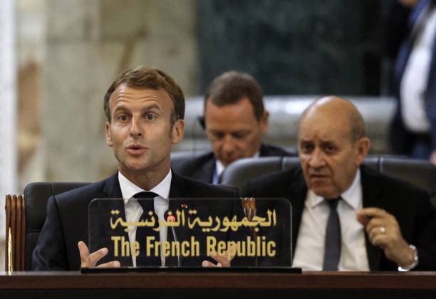 French President Emmanuel Macron in Baghdad - Iraq French President Emmanuel Macron speaks, accompanied by French Foreign Affairs Minister Jean-Yves Le Drian (R), during the Baghdad conference in the Iraqi capital on August 28, 2021. (Photo by Ludovic MARIN POOL ABACAPRESS.COM Baghdad Iraq Copyright: xMarinxLudovic Pool ABACAx 778120_032 MarinxLudovic Pool ABACAx 778120_032