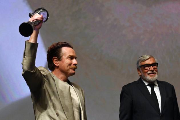 Scottish actor Ewan McGregor, left, received the Festival President’s Award from the President Jiri Bartoska, right, during the 57th Karlovy Vary International Film Festival (KVIFF), on July 1, 2023, at the Thermal Hotel in Karlovy Vary, Czech Republic. (CTKxPhoto SlavomirxKubes) CTKPhotoP2023070105795  CTKPhotoP2023070105795