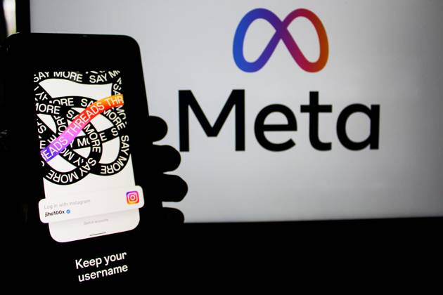 July 7, 2023, Bandung, West Java, Indonesia: In this photo illustration, Threads logo seen displayed on a smartphone and a Meta logo in the background. Threads is the new social network from Meta Platforms which was launched on the 5th of July 2023. According to Meta CEO Mark Zuckerberg, the Threads app is designed to rival Twitter. As of 6th of July 2023, the Thread app already has 10 million users. Bandung Indonesia - ZUMAs281 20230707_zip_s281_006 Copyright: xAlgixFebrixSugitax