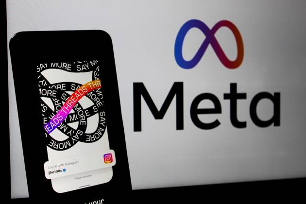 July 7, 2023, Bandung, West Java, Indonesia: In this photo illustration, Threads logo seen displayed on a smartphone and a Meta logo in the background. Threads is the new social network from Meta Platforms which was launched on the 5th of July 2023. According to Meta CEO Mark Zuckerberg, the Threads app is designed to rival Twitter. As of 6th of July 2023, the Thread app already has 10 million users. Bandung Indonesia - ZUMAs281 20230707_zip_s281_007 Copyright: xAlgixFebrixSugitax